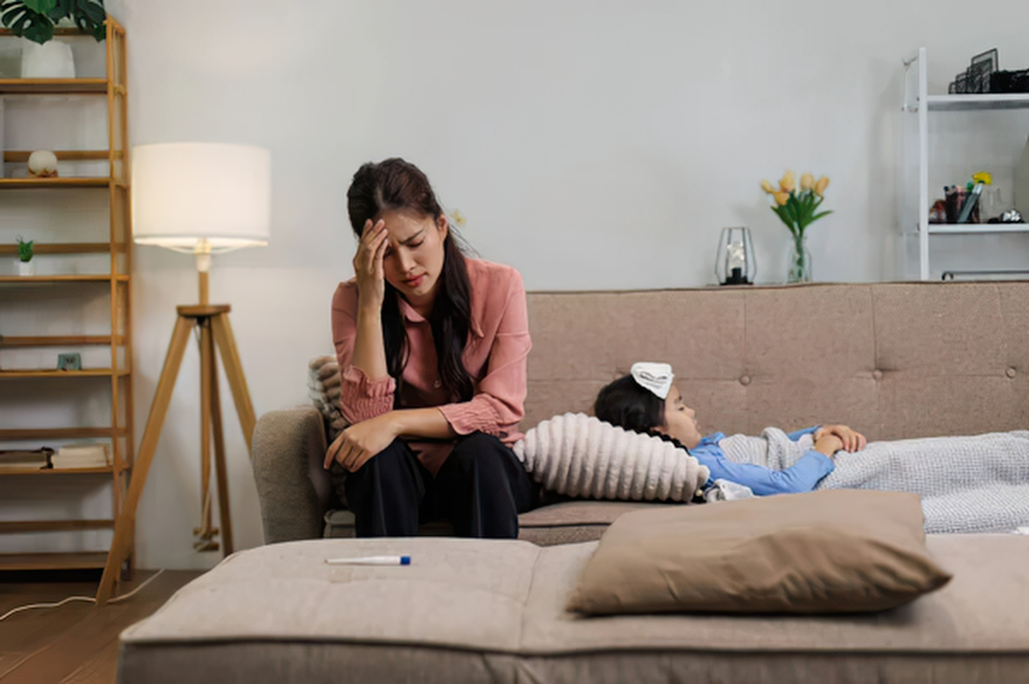 tired mom sitting couch