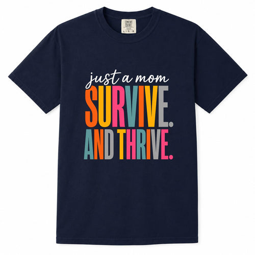 Comfort Colors navy t-shirt with colorful "Just a Mom, Survive and Thrive" empowering mom life shirt design